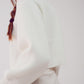 High neck jumper with balloon sleeve in cream Szua Store