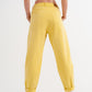 High rise mom jeans with pleat front in yellow Szua Store