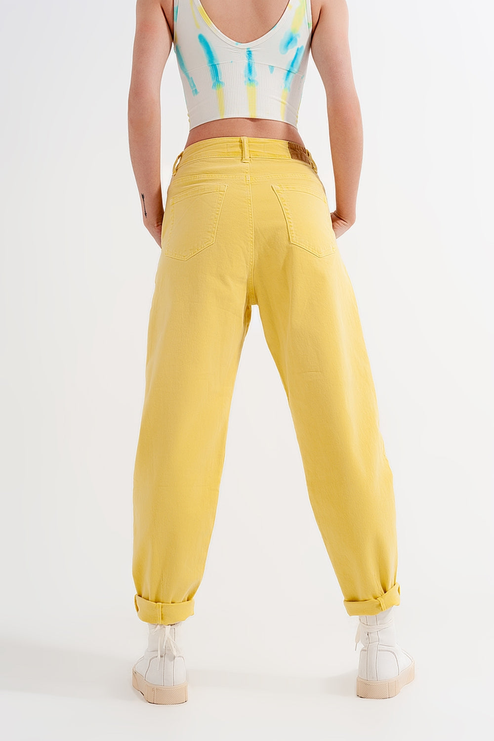High rise mom jeans with pleat front in yellow Szua Store