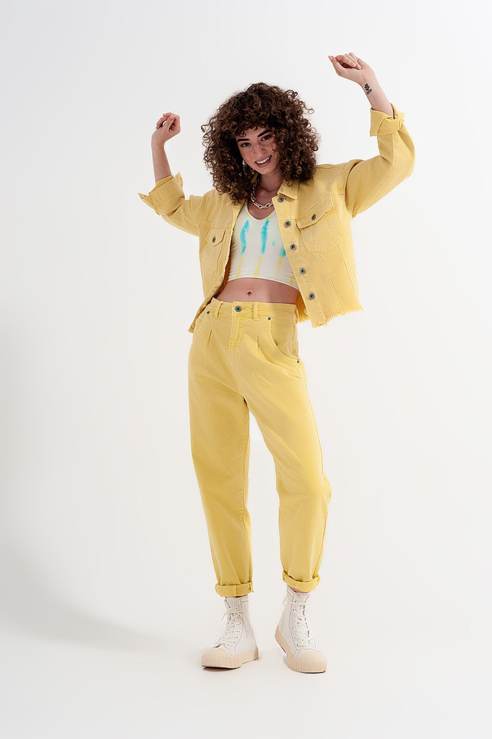 High rise mom jeans with pleat front in yellow Szua Store