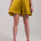 High rise satin shorts in lime green Szua Store