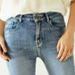 High-waisted jeans with five pockets with silver powder-coated effect