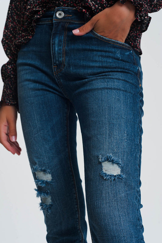 High waisted skinny jeans in dark wash blue with ripped details Szua Store