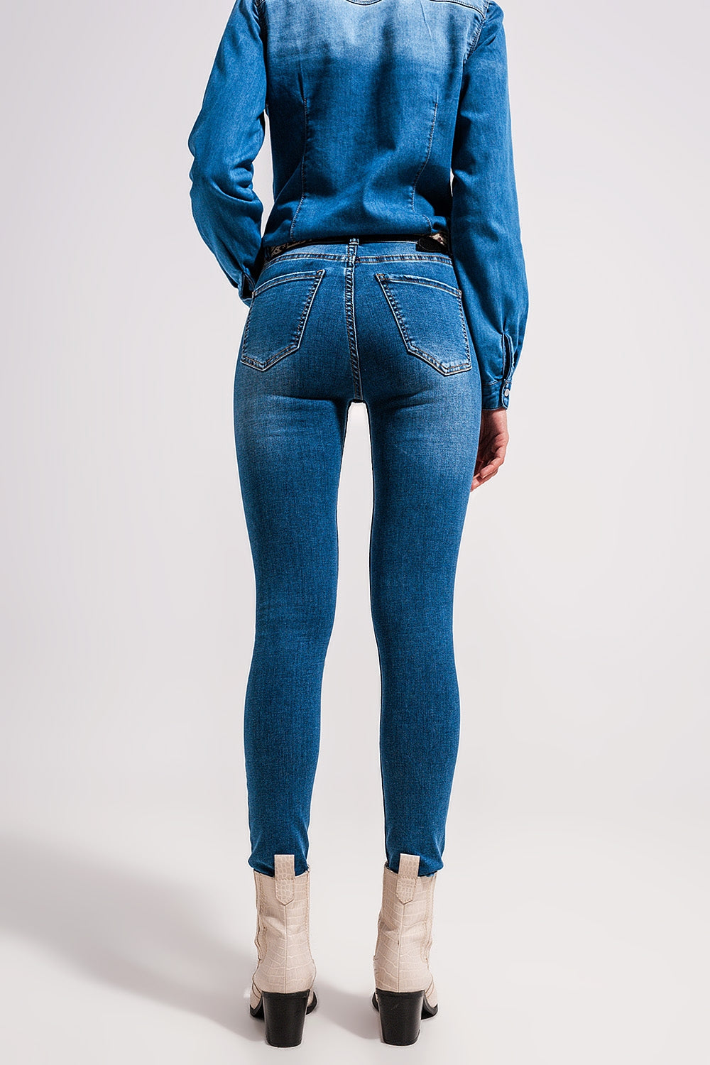 High waisted stretch skinny jeans in mid wash blue Szua Store