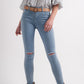 Jean with distressed knee in blue Szua Store