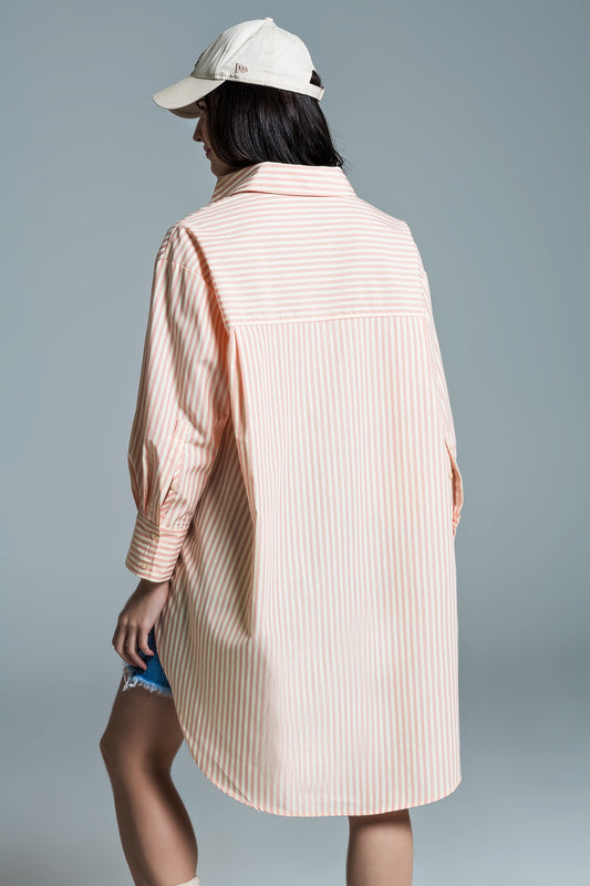 Blusa oversize naranja claro con rayas blancas
