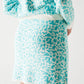 Lightweight knit mini skirt in turquoise animal print Szua Store