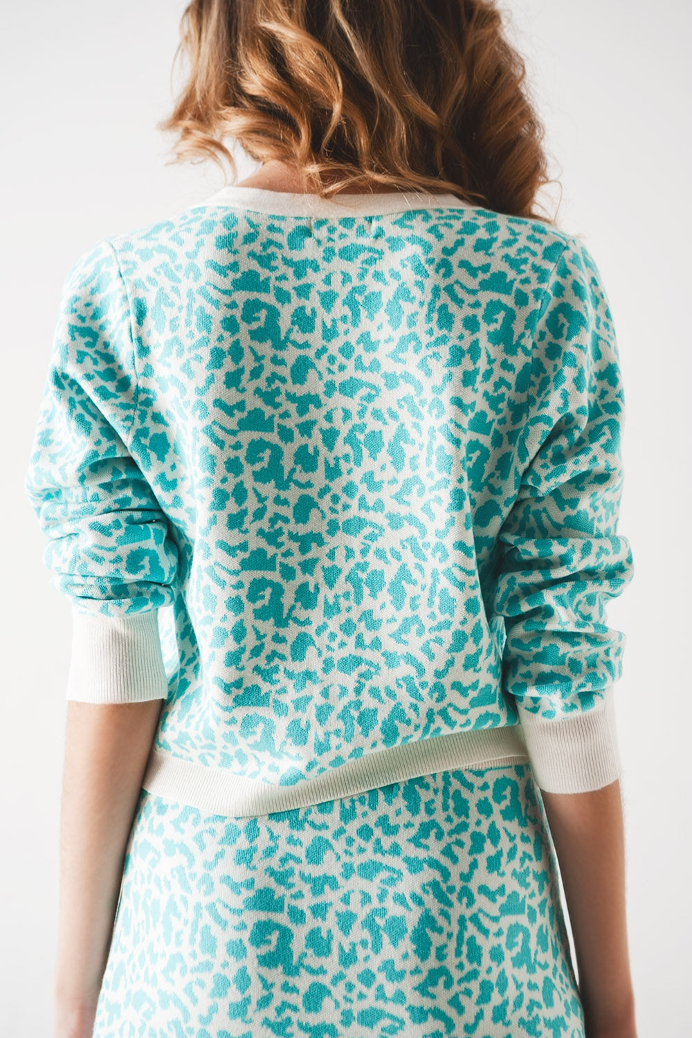 Lightweight knitted cardigan in turquoise animal print Szua Store