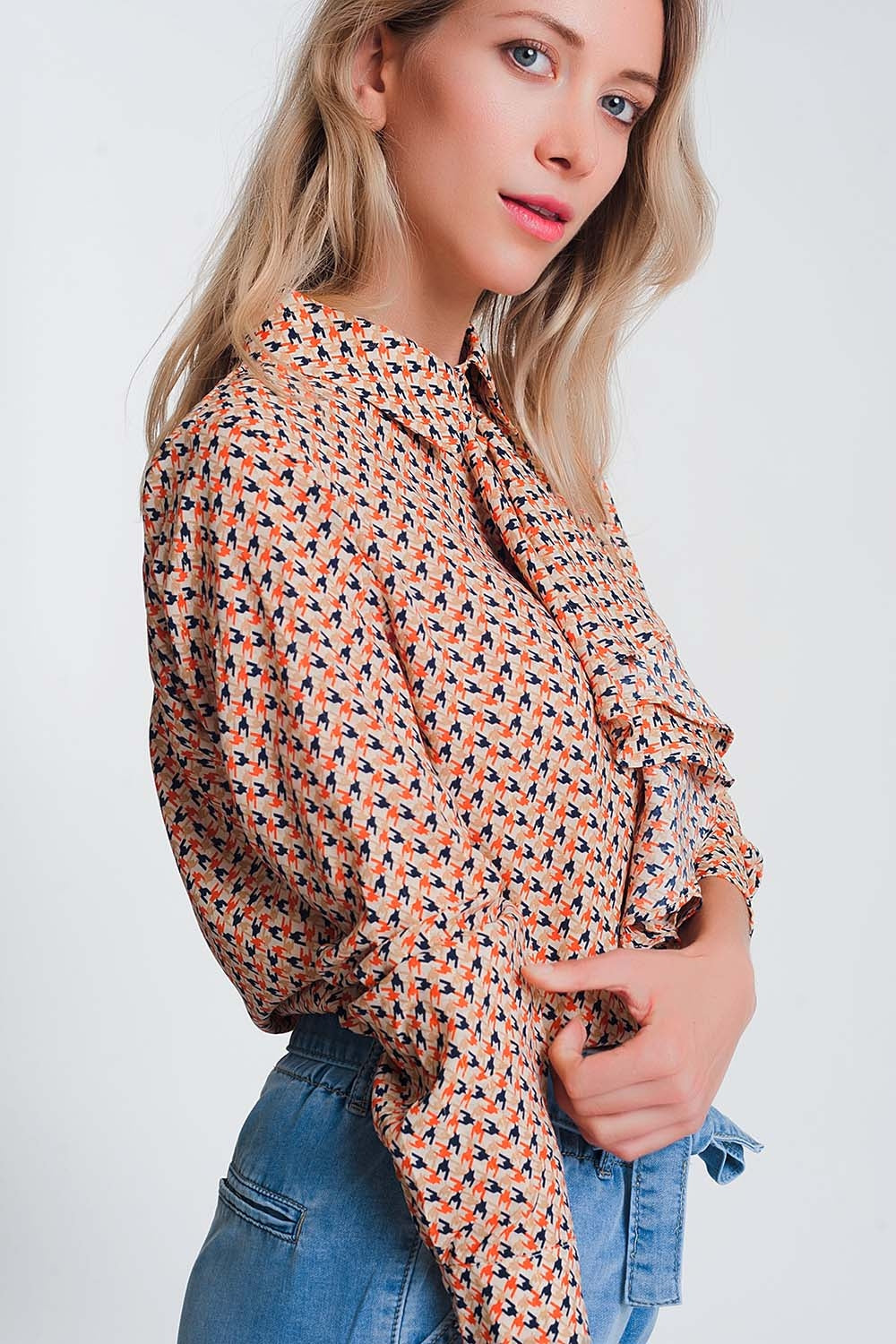 Long sleeve blouse with ruffle detail in beige Szua Store