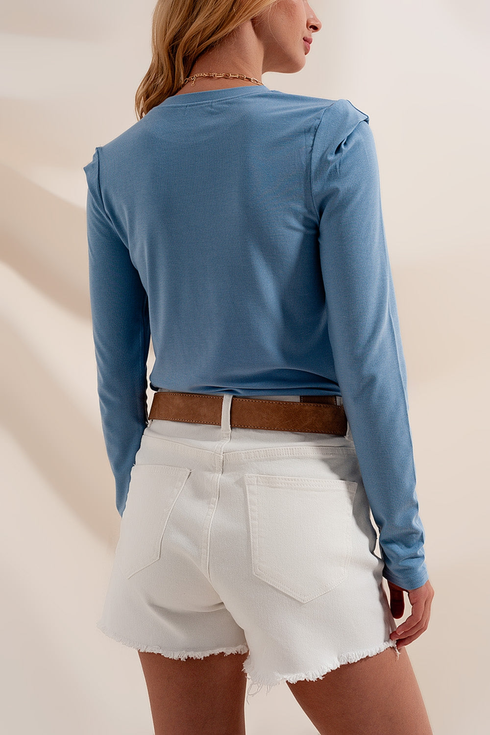 Long sleeve top with shoulder detail in blue Szua Store