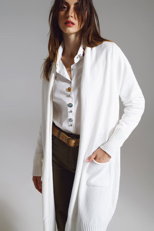 Q2 Long white cardigan with folded pockets