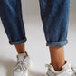 Jeans estilo mom tiro alto lavado medio