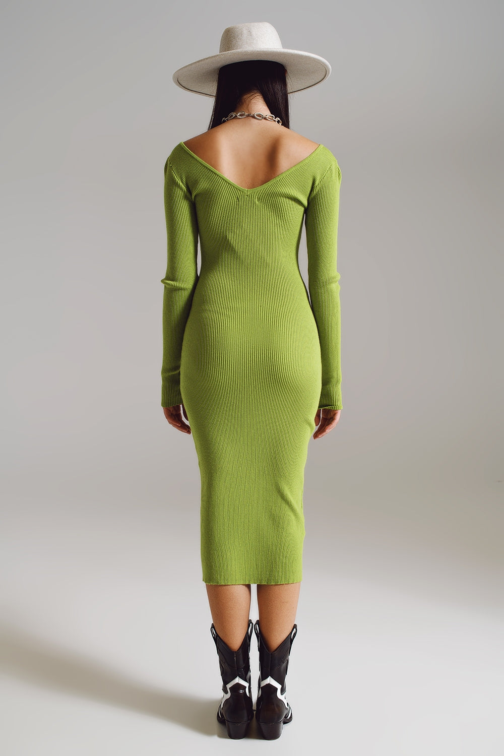 Midi bodycon knitted dress with V-neck in green.