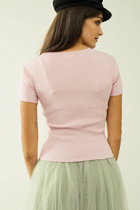Pink sweater with crossed front and V-neck
