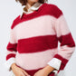 Pink sweater with stripes and a crew neck