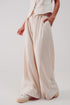 Pleated wide leg pants in cream Szua Store