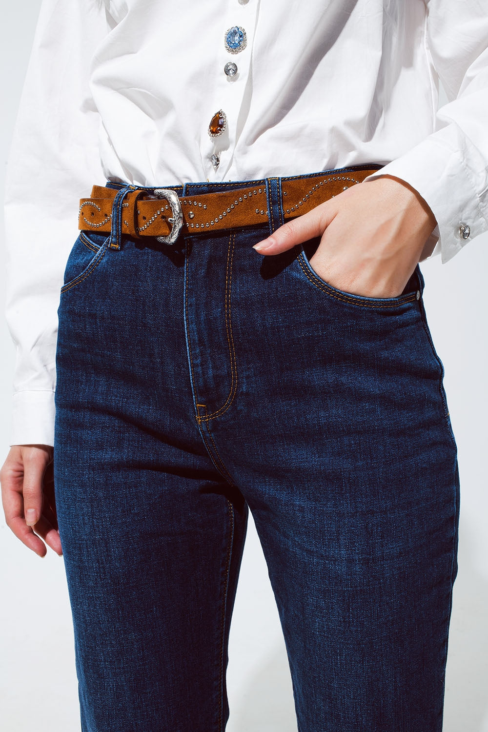 Relaxed fit blue jeans with cuffed hem detail