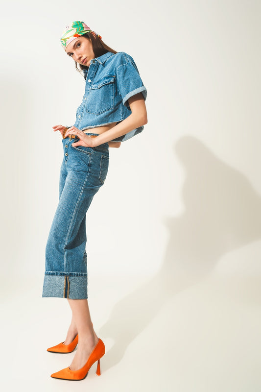 Relaxed jeans with rolled hem and exposed buttons in blue - Szua Store