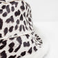 Reversible bucket hat in leopard print in ecru Szua Store