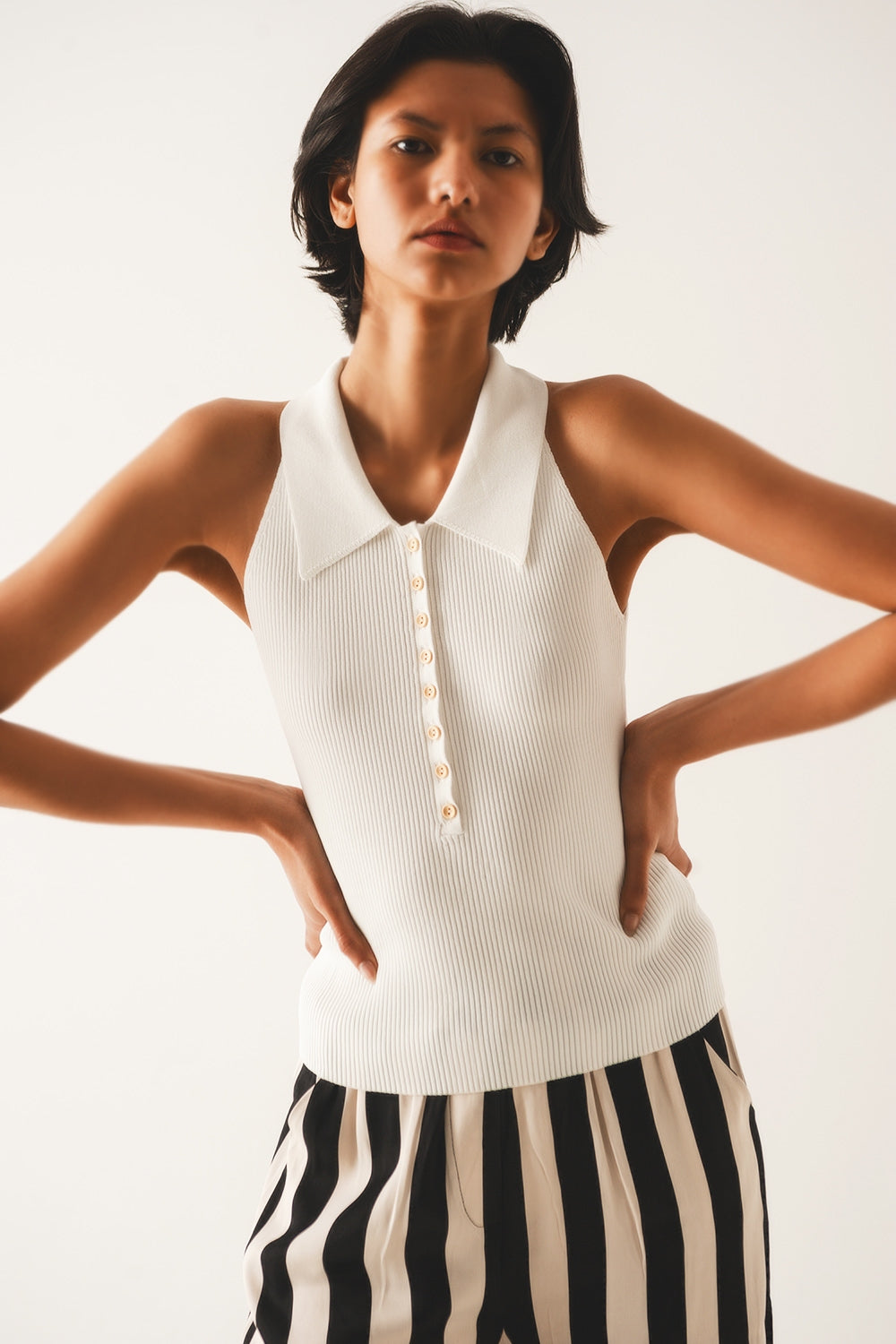 Ribbed knitted top with polo neck in cream - Szua Store