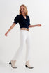 Rigid cropped flare jeans in cream with raw hem Szua Store