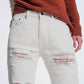 ripped boyfriend jeans in beige Szua Store