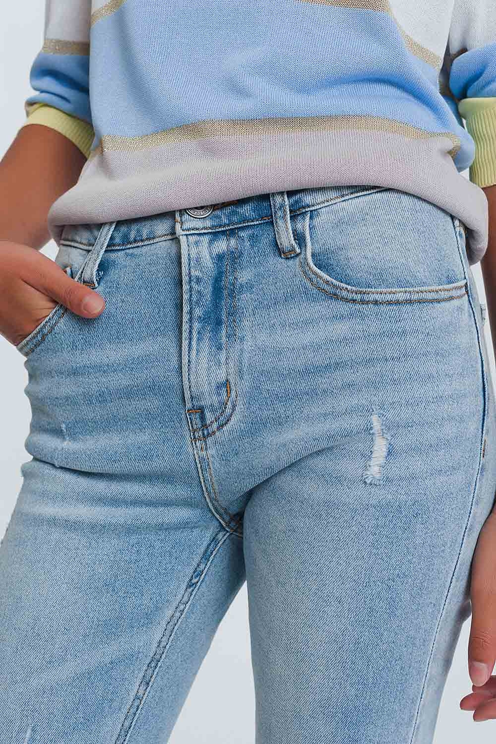 Ripped knee raw hem skinny jeans in light blue - Szua Store