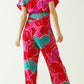 Satin Colored wide leg pant with floral designs