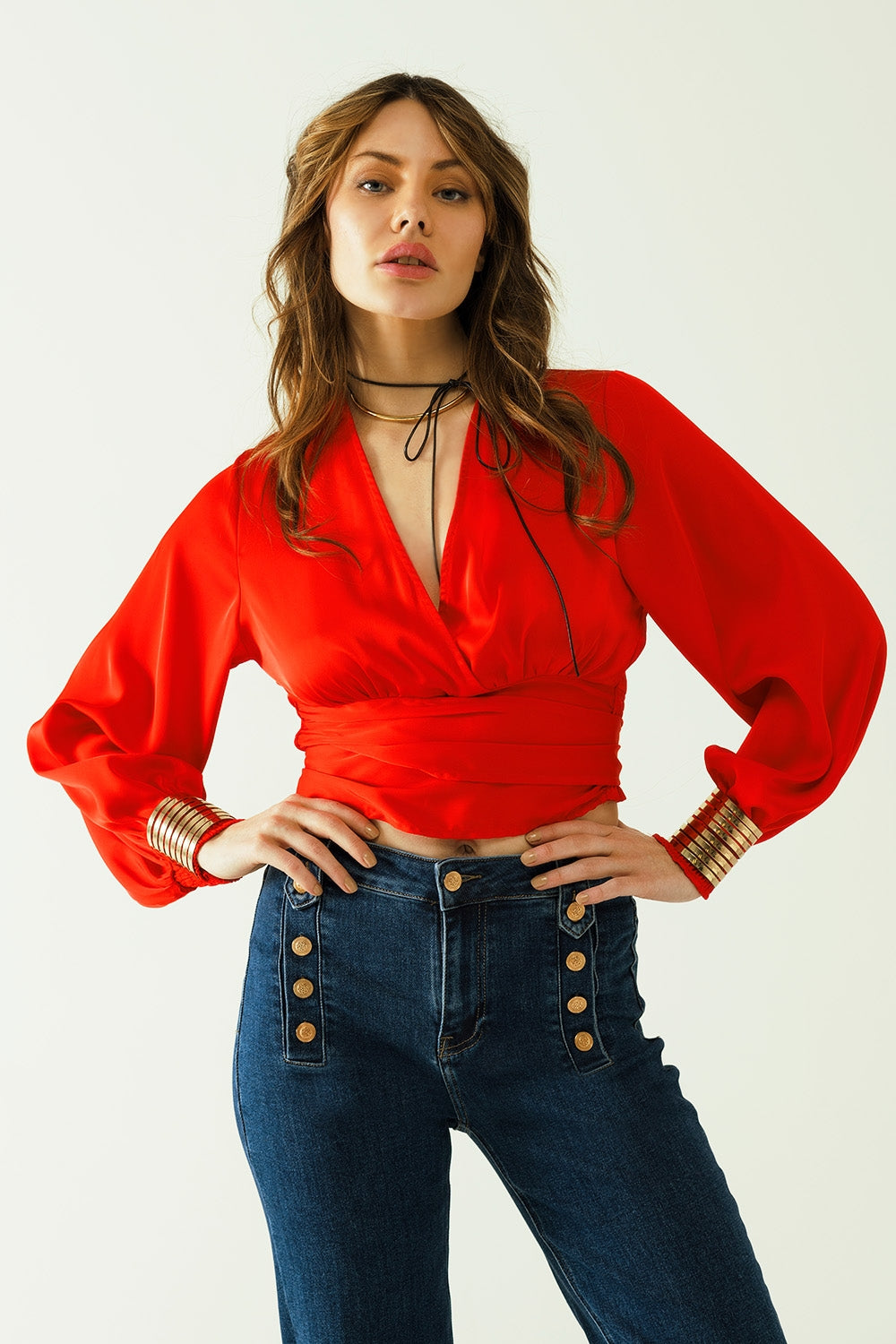 Short red crop top with long and wide sleeves