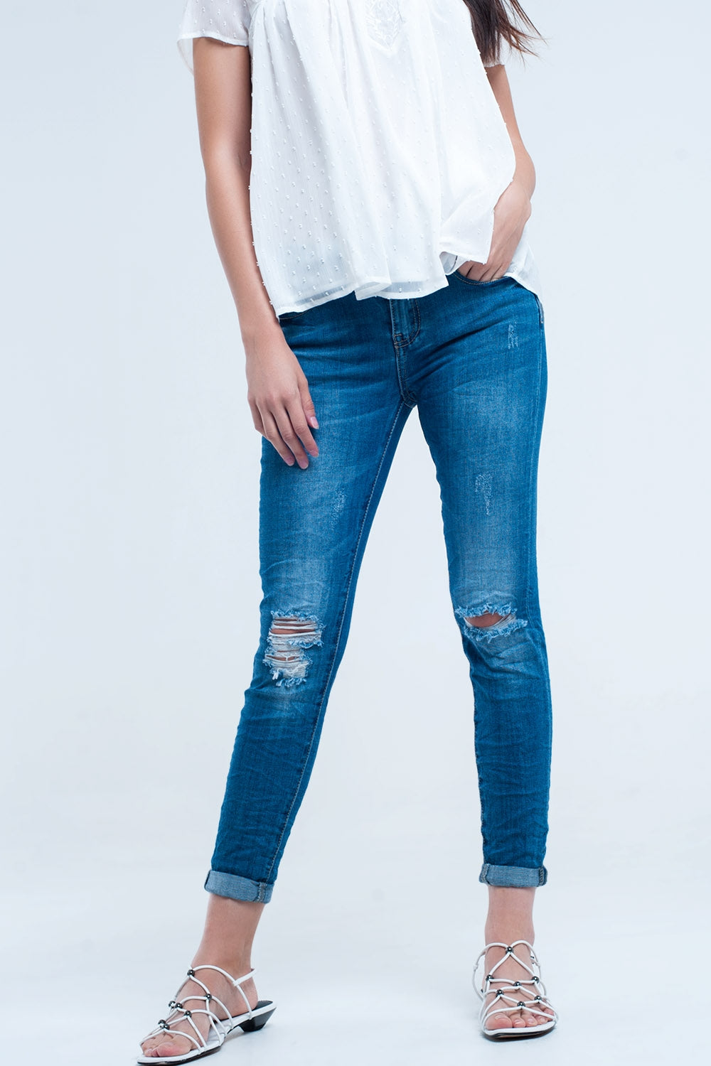 Skinny elastic jeans with rips