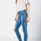 Skinny jeans in midwash with busted knees and chewed hems Szua Store