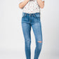 Skinny jeans in midwash with busted knees and chewed hems Szua Store