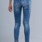 Skinny jeans with rips Szua Store