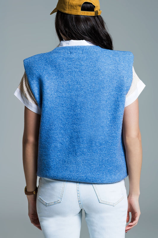 Sleeveless sweater in blue with silver sequin hearts