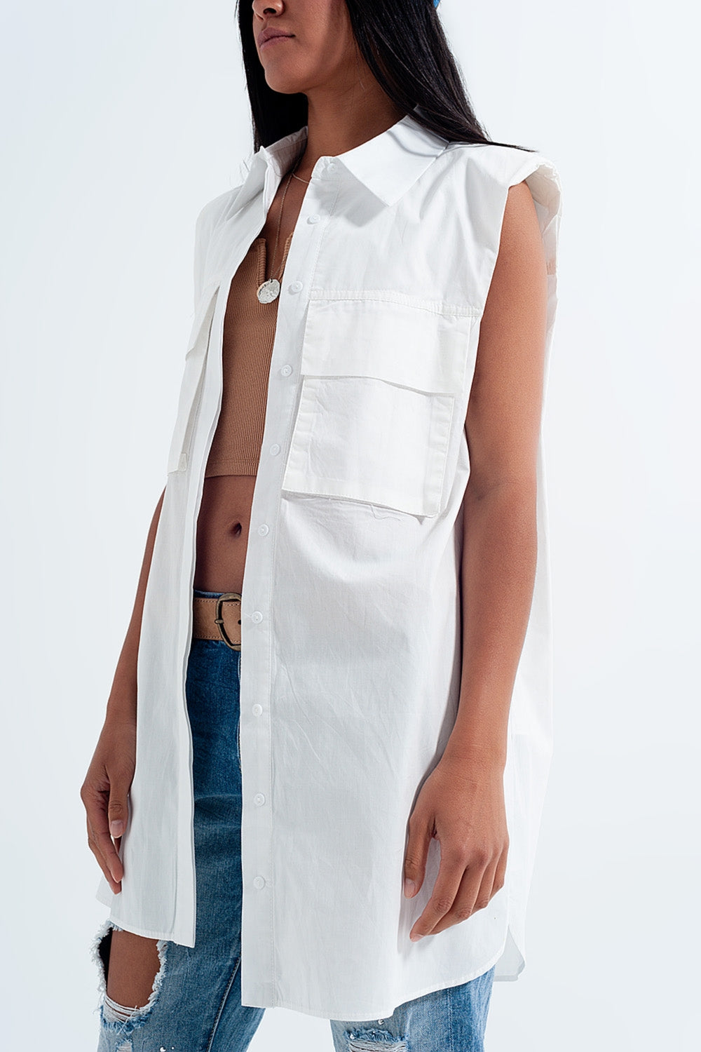 Sleeveless white poplin shirt with shoulder pads and utility pockets - Szua Store