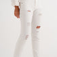 Slim jeans in white with distressing Szua Store