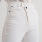 Slim jeans with asymmetric button in cream Szua Store