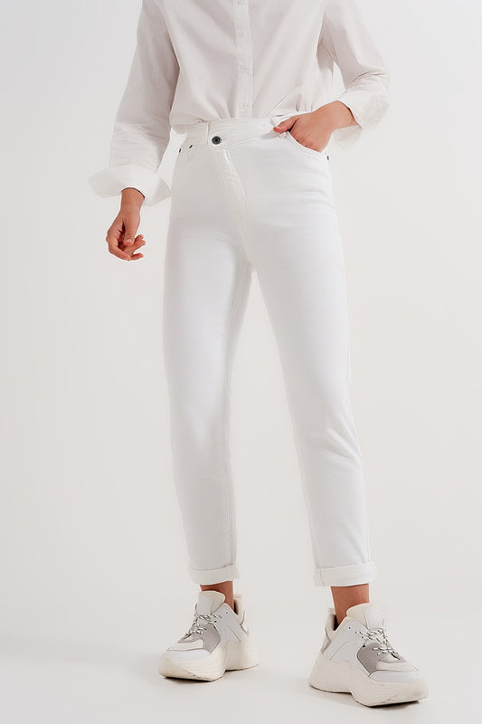 Slim jeans with asymmetric button in cream Szua Store