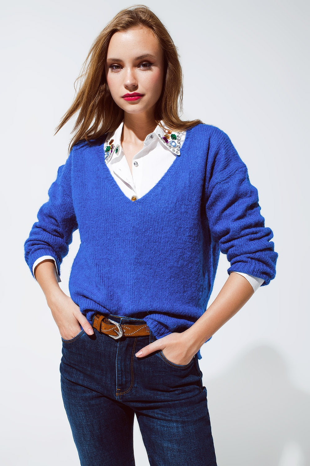 Q2 Soft blue jumper with wide V-neck