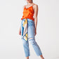 Sraight-leg jeans with exposed buttons and ripped knees in light wash - Szua Store