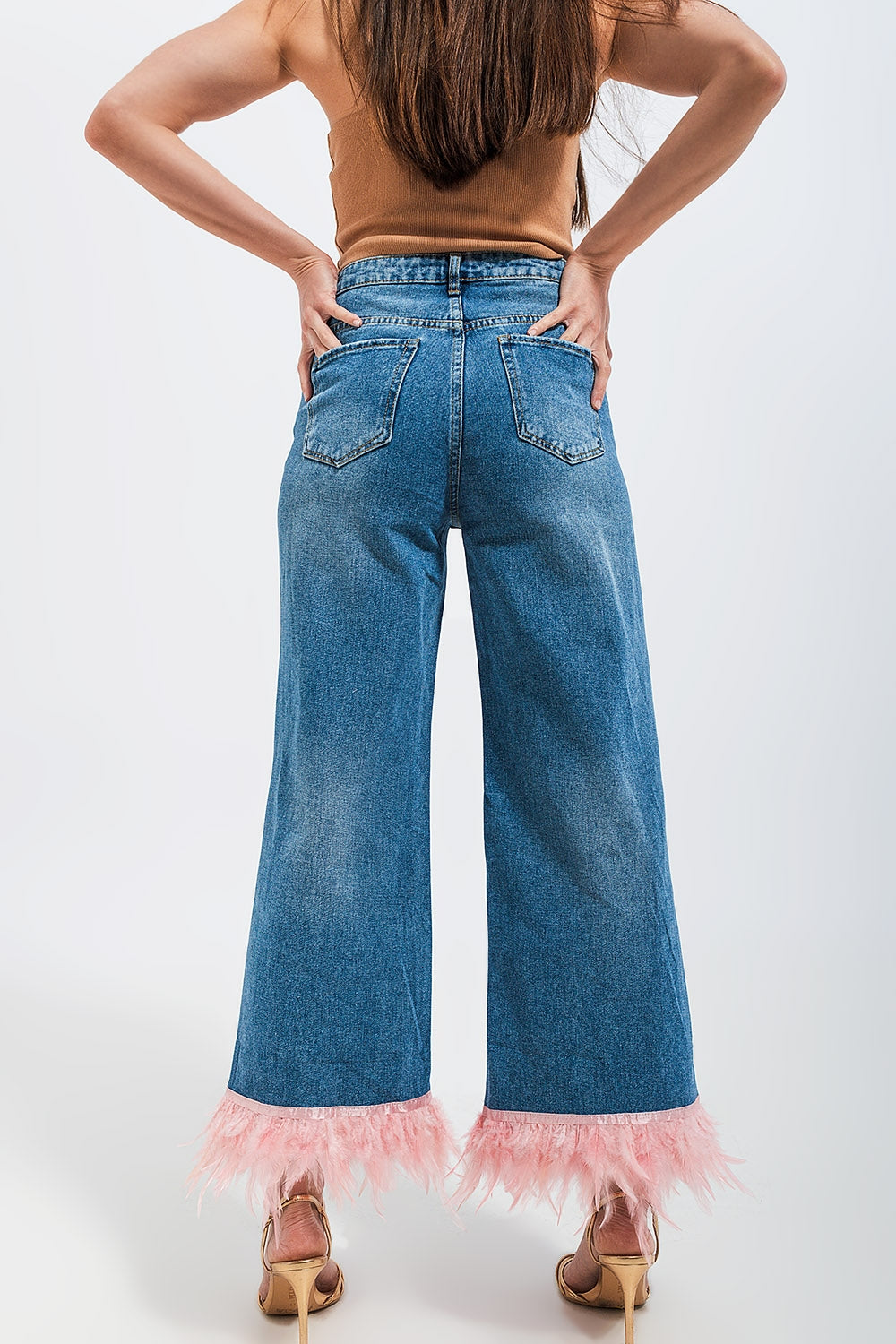 Straight leg jeans with faux feather hem in pink Szua Store