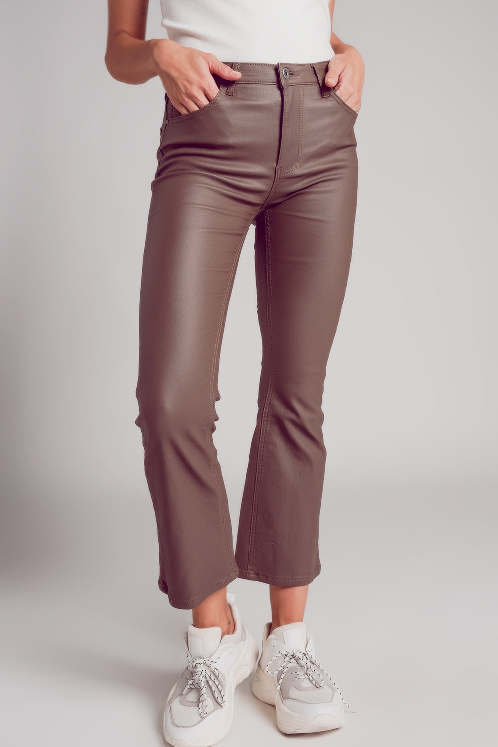 Stretch faux leather flare pants in beige Szua Store