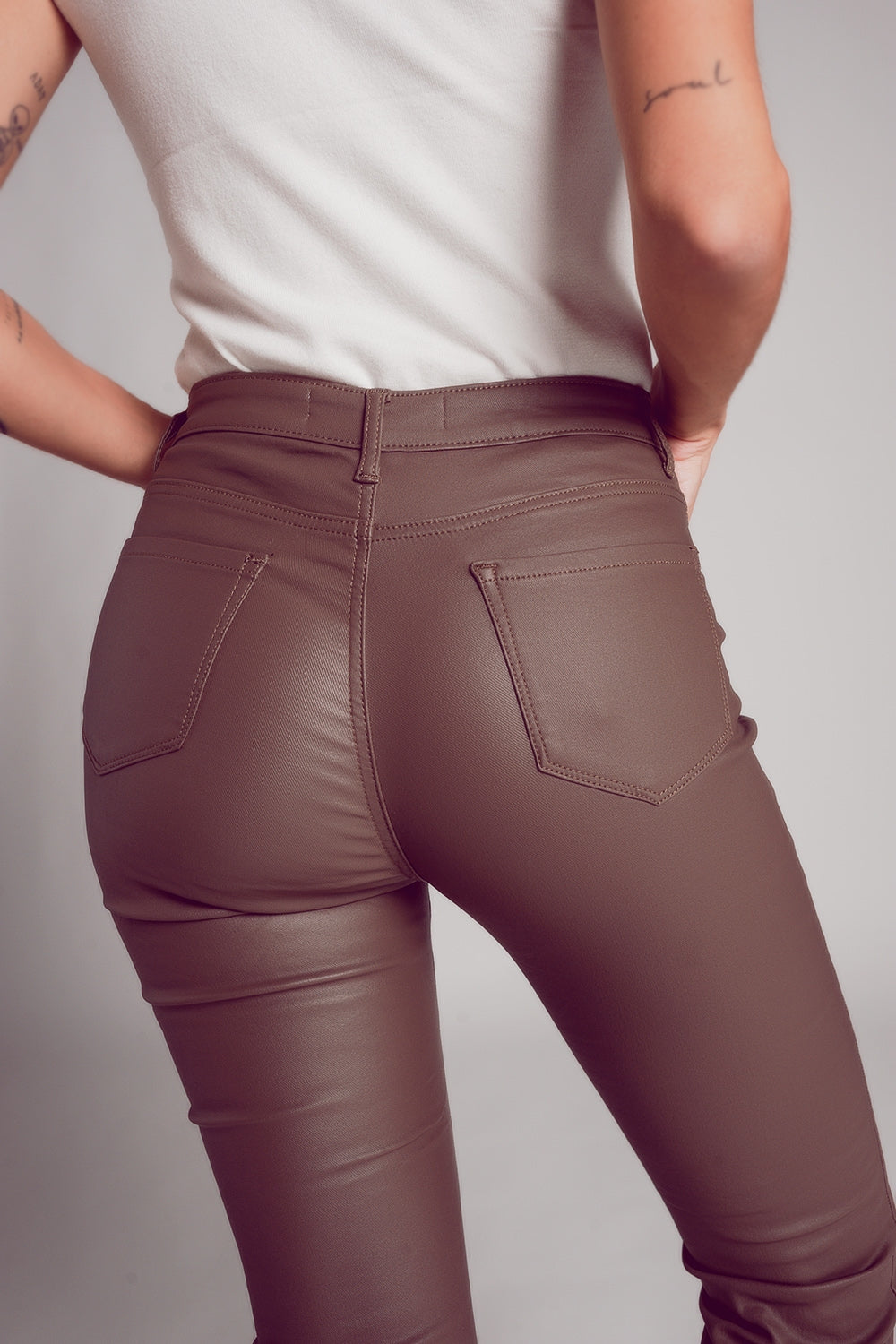 Stretch faux leather flare pants in beige Szua Store