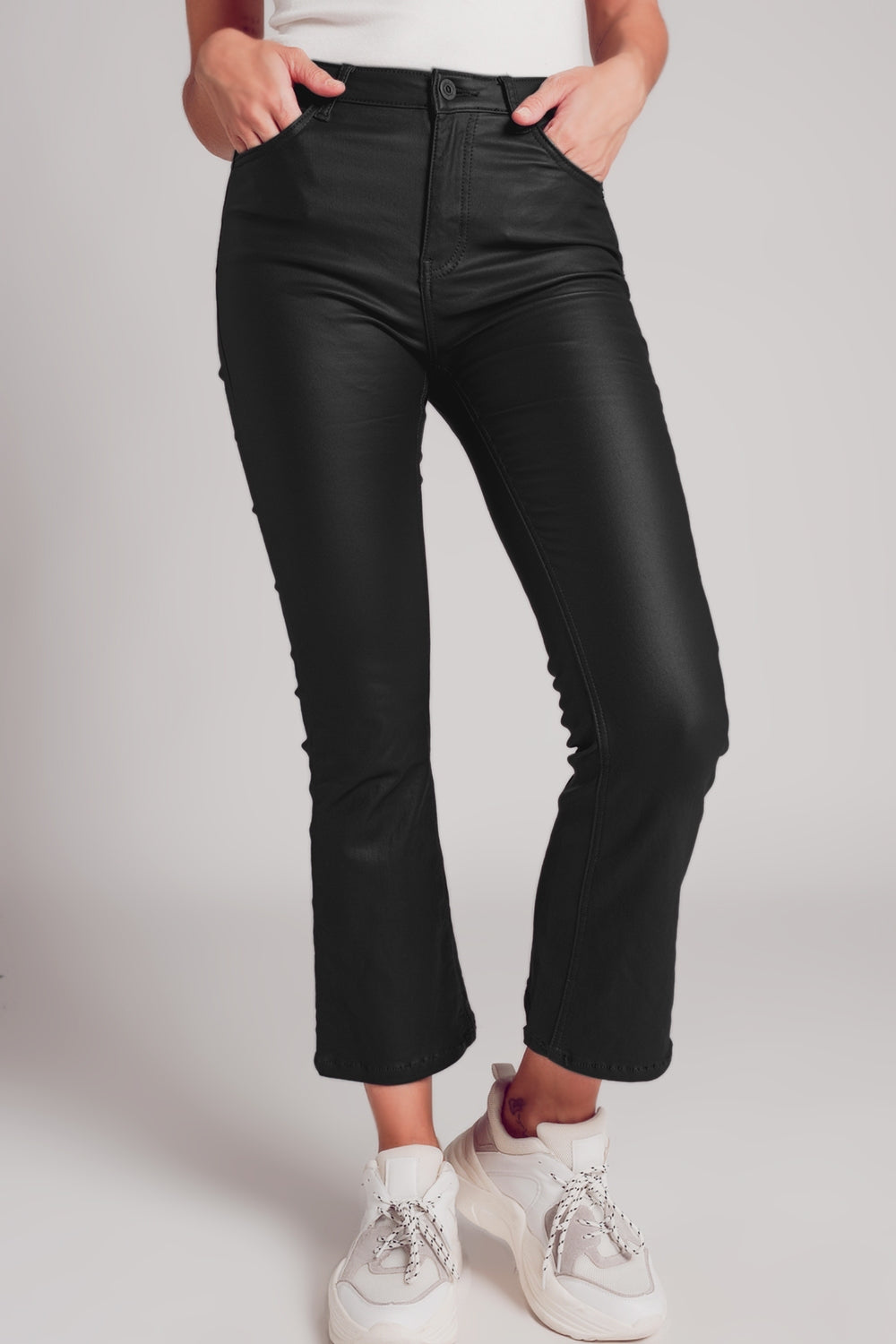 Stretch faux leather flare pants in black Szua Store