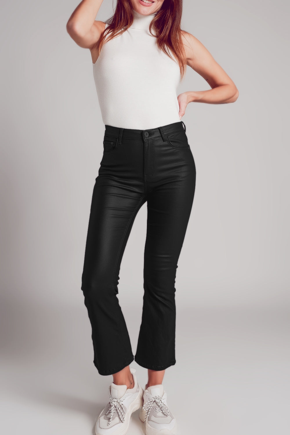 Stretch faux leather flare pants in black Szua Store