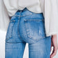super skinny jeans in vintage mid wash blue with heavy rips Szua Store