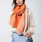 Q2 Thin scarf with mixed knits in shades of orange