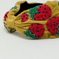Velvet headband with strawberry-shaped bead embellishments