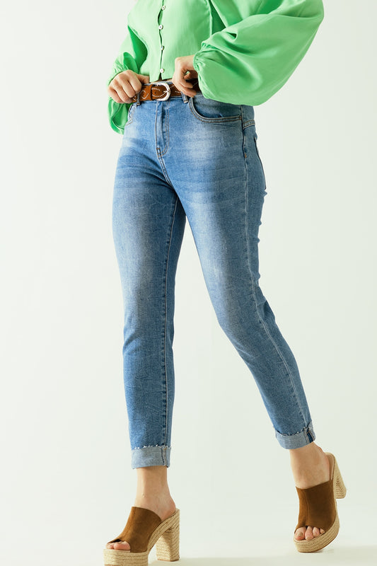 Washed effect push-up jeans with five pockets and hem