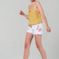 White denim shorts with embroidered flowers Szua Store